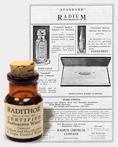 A bottle of Radithor sitting in front of a paper advertisement for it. The Radithor bottle's label indicates that it is certified radioactive water.