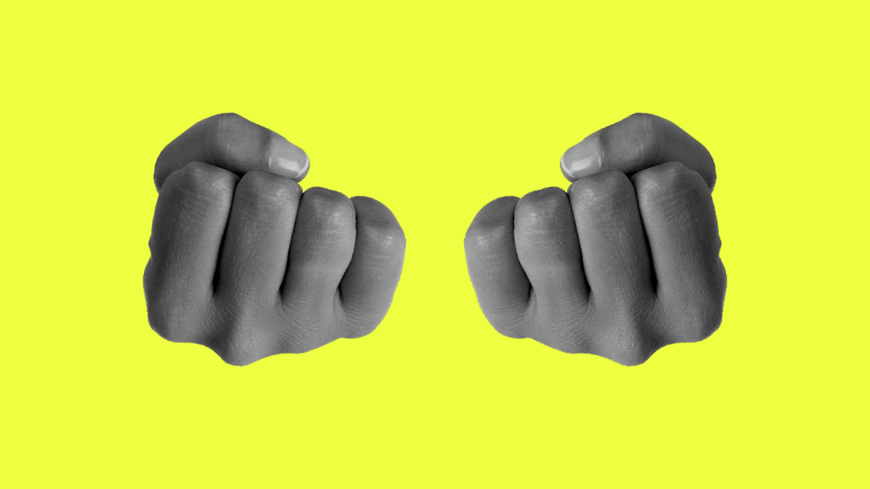 Two fists, palm-up with thumbs facing outwards.