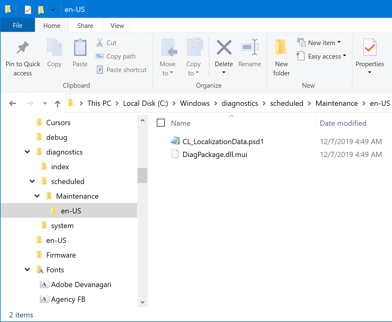 A Windows 10 file explorer window. It is set to show a tree view on the left and a detail view on the right. The tree view demonstrates navigating into a folder seven levels deep, and how other directories can also be open at the same time to show subfolders and file contents. The folder that is currently open is called, 'en-US', and is located in a file path that is, 'This PC', then 'Local Disk (C:)', then 'Windows', then 'diagnostics', then 'scheduled', then 'Maintenance'. The details view shows the file contents of the 'en-US' folder. Cropped screenshot.