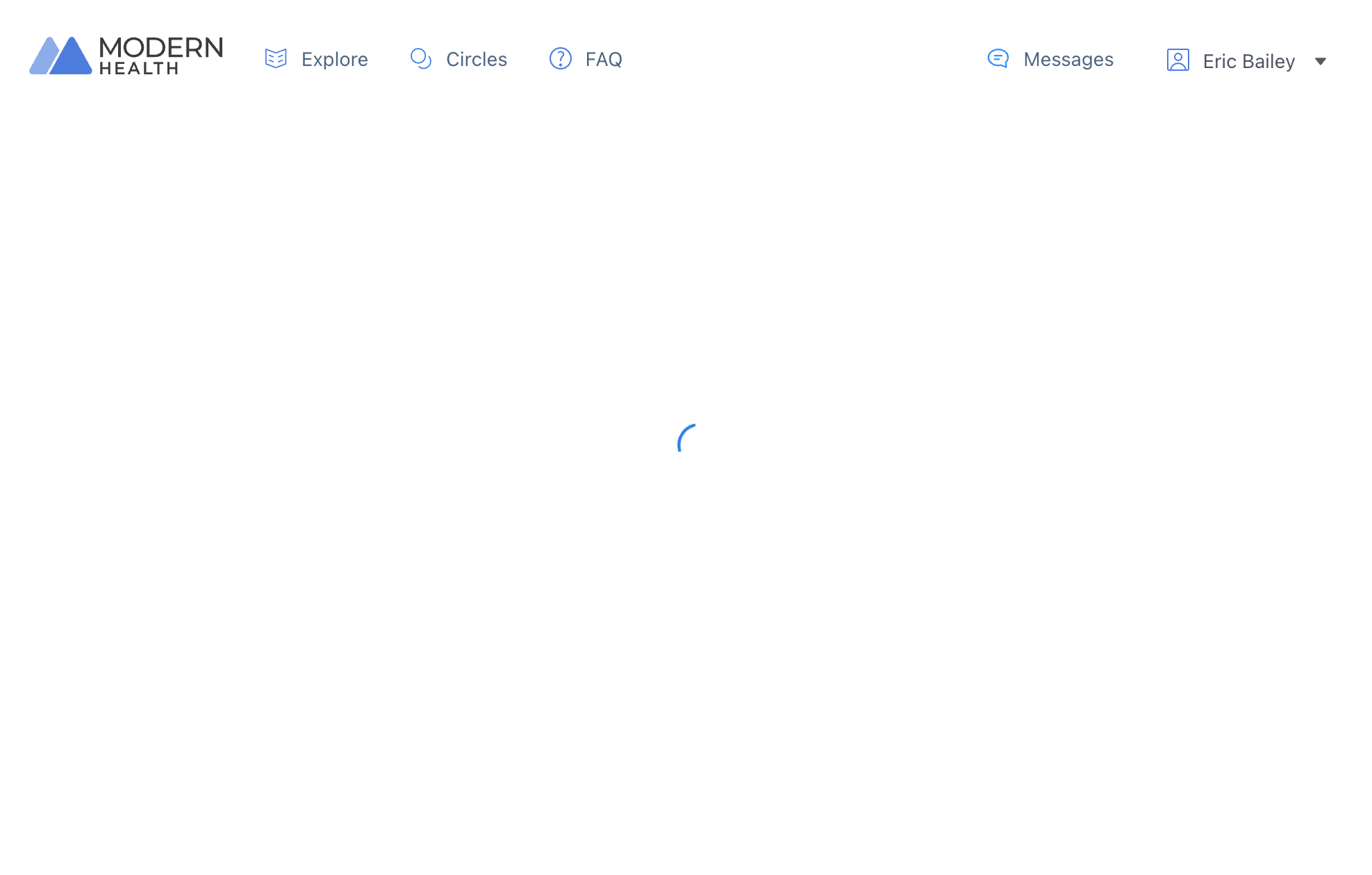 An almost entirely blank white screen. In the top lefthand corner is the Modern Health log, and navigation options for 'Explore', 'Circles', and 'FAQ'. On the top righthand corner is navigation options for 'Messages' and my profile. In the center of the screen is a small loading spinner. Screenshot.